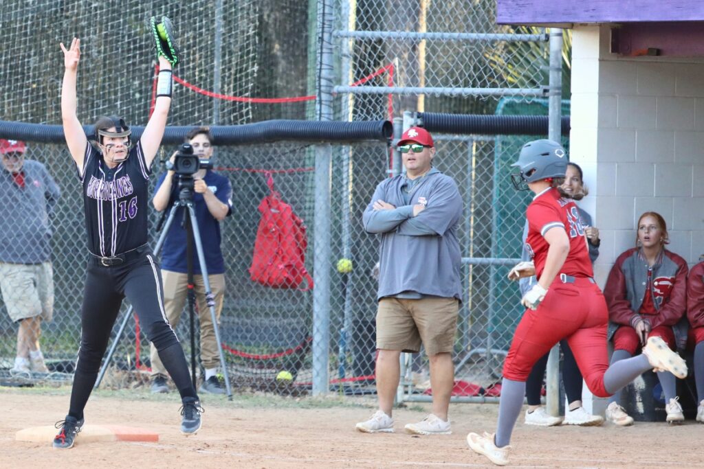 Gainesville first baseman Adriana Koralewski snags a throw to get Santa Fe's Ainslea Kelsoe out in the top of the second inning.