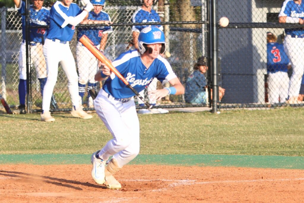 Keystone Heights' Ty Mitzel lays down a bunt in the top of the fifth inning against Santa Fe.