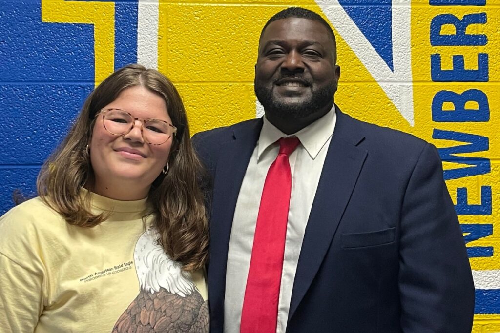 Newberry High School's first-place winner was Audrey Ellenburg (left) with NHS principal James Sheppard.
