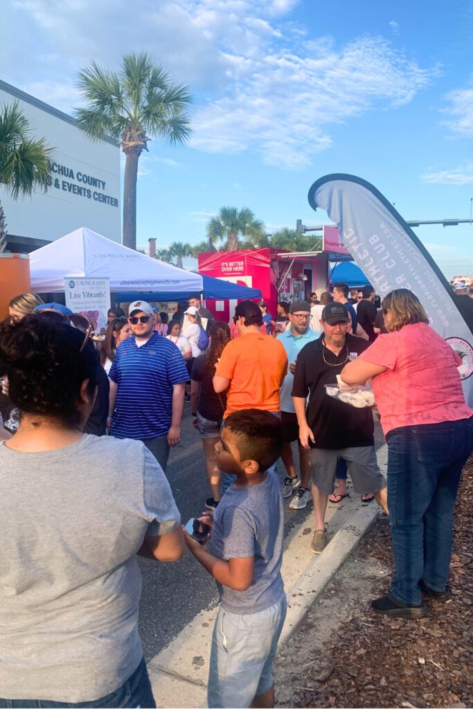 Pampy's Bakery gives out samples to the crowd passing by on the street during the GCM Food Fest.