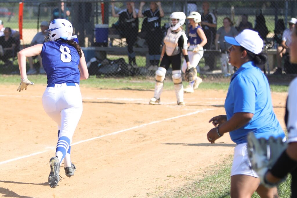 Countryside Christian's Alison Scarborough (8) scores the Minutemen's first run against Class 2A Regional Quarterfinals on Wednesday.