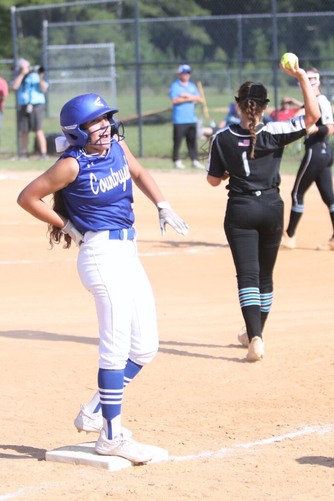 Countryside Christian's Vanessa Colon dusts off at third base after driving in a run against Providence (Jacksonville) in the Class 2A Regional Quarterfinals on Wednesday.