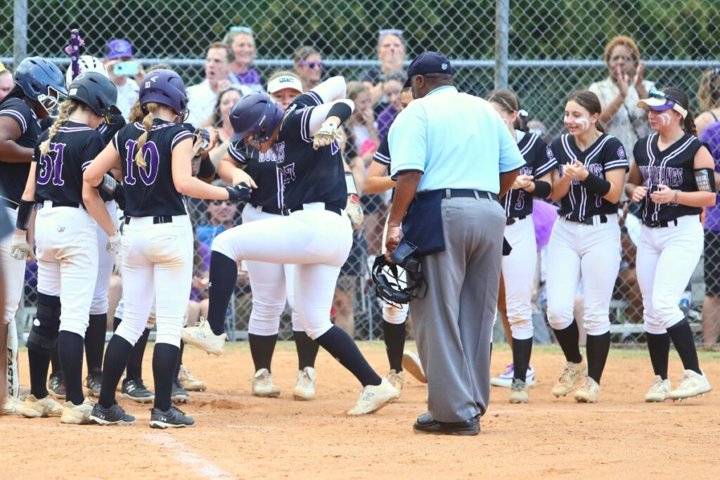 Gainesville's Braylin Cook (leg up) put the Hurricanes up to stay with a three-run home run in the first inning against Deltona in the Region 1-5A Quarterfinals on Thursday.