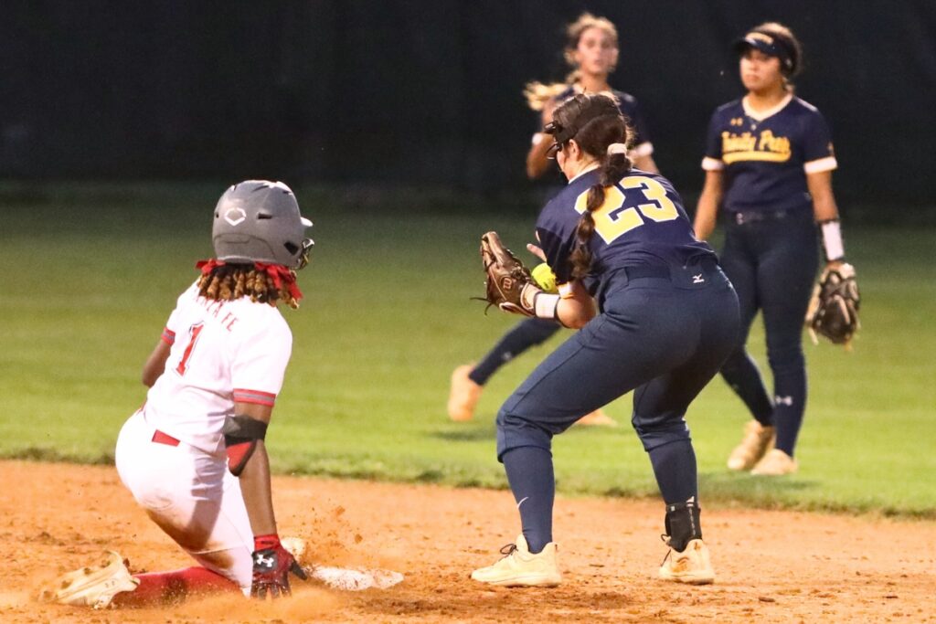 Santa Fe's J'lyn Guiden slides safely to second base after hitting a double against Trinity Prep (Winter Park) in the Class 3A-Region 2 Semifinal on Tuesday.