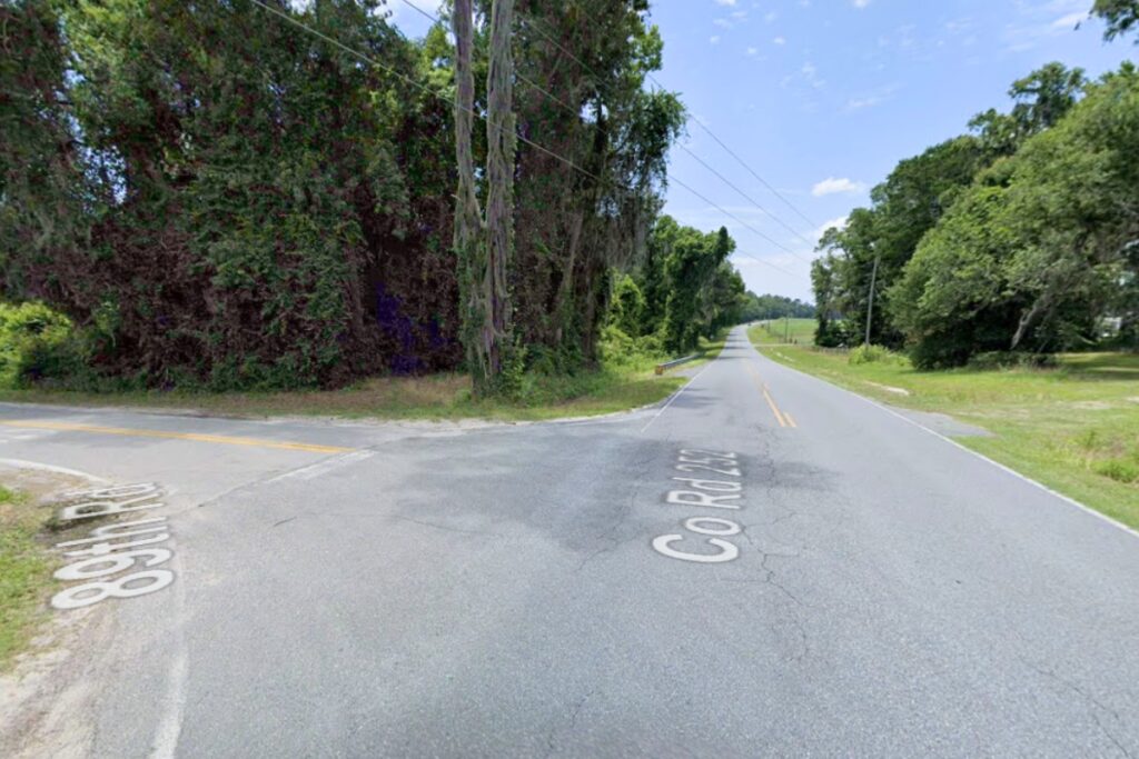 A 62-year-old Live Oak woman died when her pickup left CR 252 northeast of McAlpin on Monday night, hit a guardrail and caught fire.