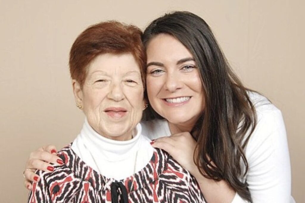 Christina Ramos, executive director of Touch Hearts at Home and her grandmother, Rita Noa, who has dementia in a family photo.