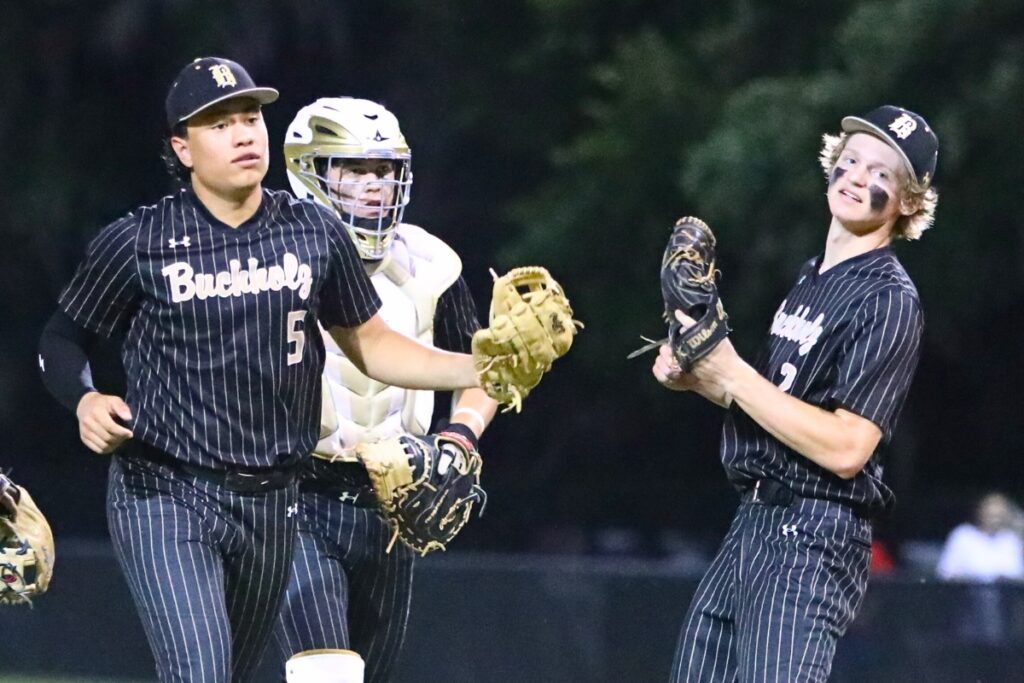 (From left) Buchholz's J.J. Gardner, Noah Hayse and Aiden Kastensmidt helped lead the Bobcats to the Class 6A championship game in program history.
