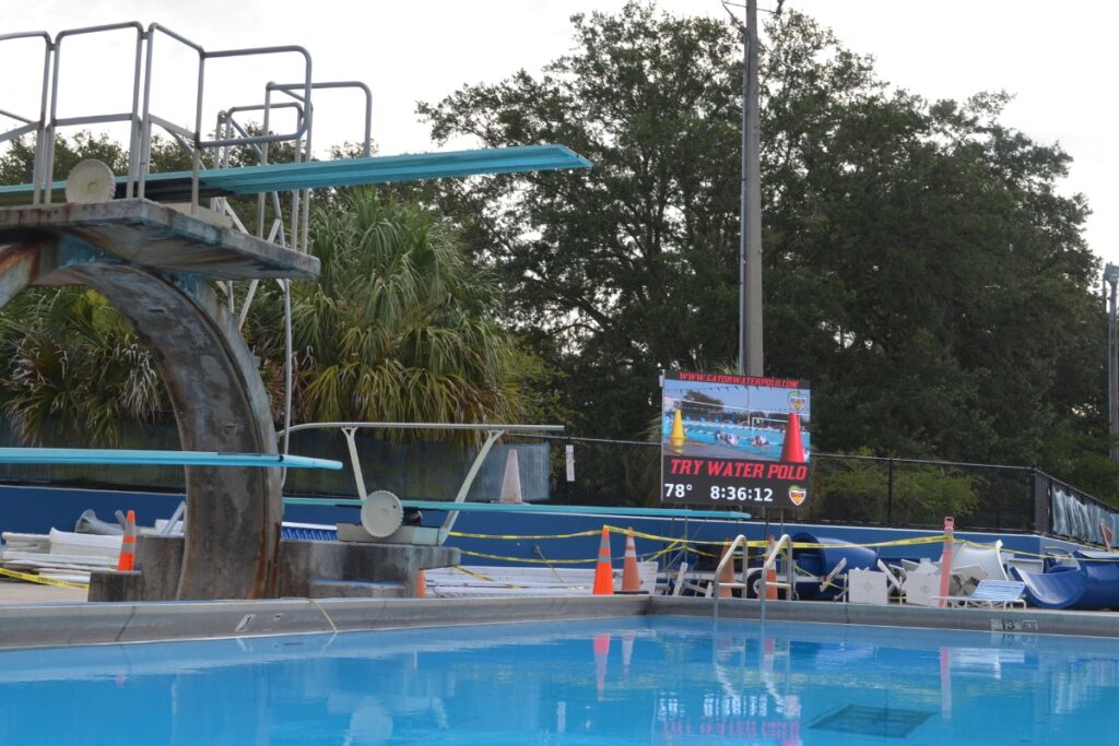 Gator Water Polo sign at at Dwight H. Hunter Northeast Pool