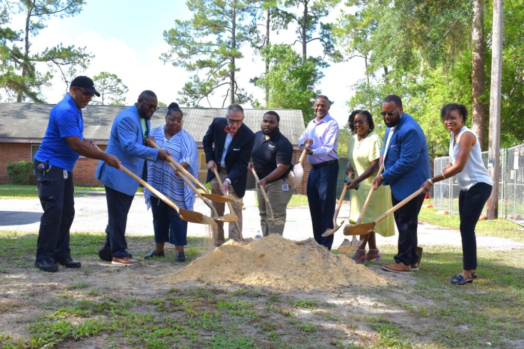 L-R Lancelot Wallace, Malcolm Kiner, Stephanie Seawright, Michael Eaton, Freddie Jones, Ralph Hilliard, Pamela Davis, George Johnson, Angela Tharpe, breaking ground on the new jobs training center.
