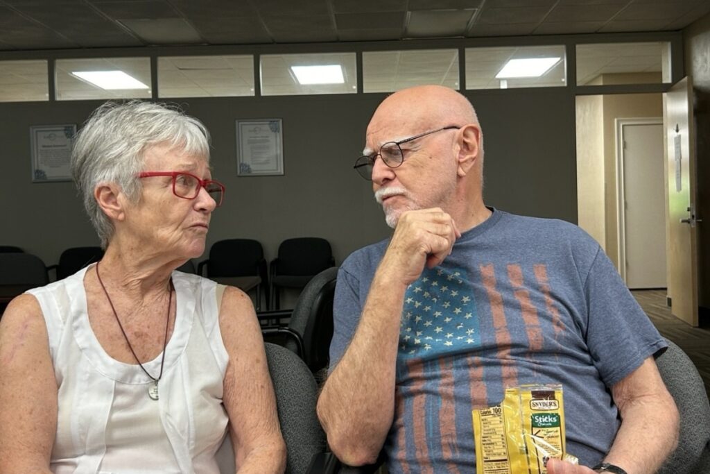 Pat Fowler (left) and her husband, Rick Fowler, at a Savvy Caregiver meeting.