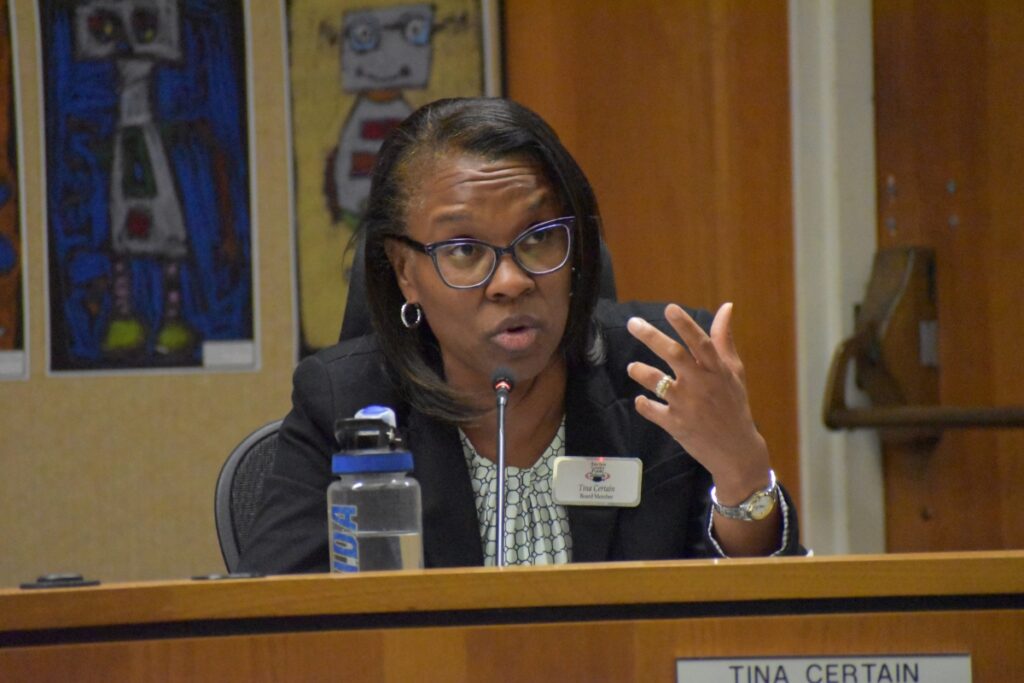 Board Member Tina Certain speaks from the dais at Tuesday's meeting.