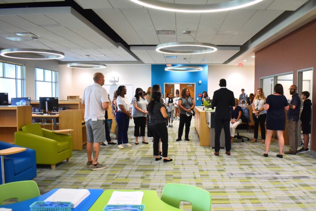 A tour group admires Westwood's new media center.