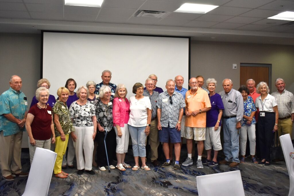 Members of the GHS class of '59 gather for a group photo.