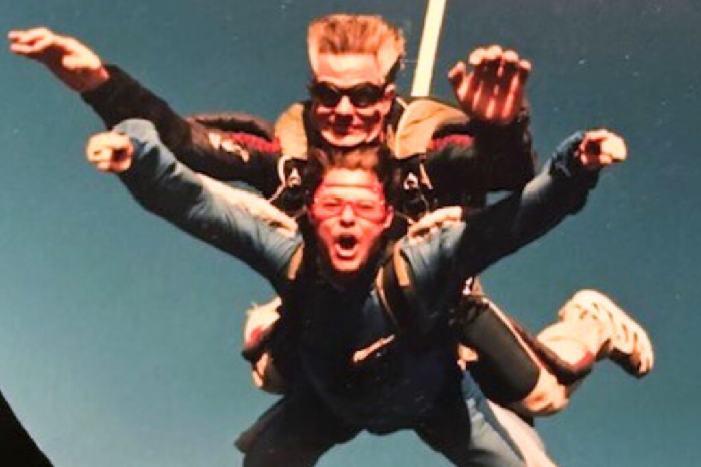 Mike Ridaught (on bottom) jumped out of an airplane and did a 'live' broadcast for Valentine's Day in 2000.