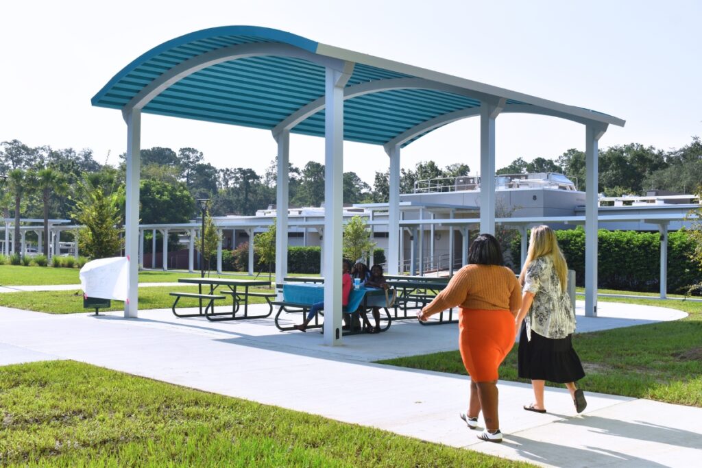 The courtyard includes a shaded, outdoor classroom where teachers can choose to take a class.