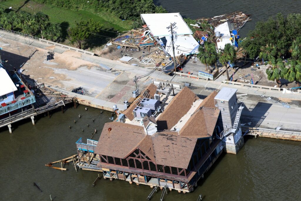 Damaged buildings in Cedar Key, Fla., as seen from the air Friday, September 27, 2024, following Hurricane Helene’s landfall as a Category 4 storm Thursday night. 