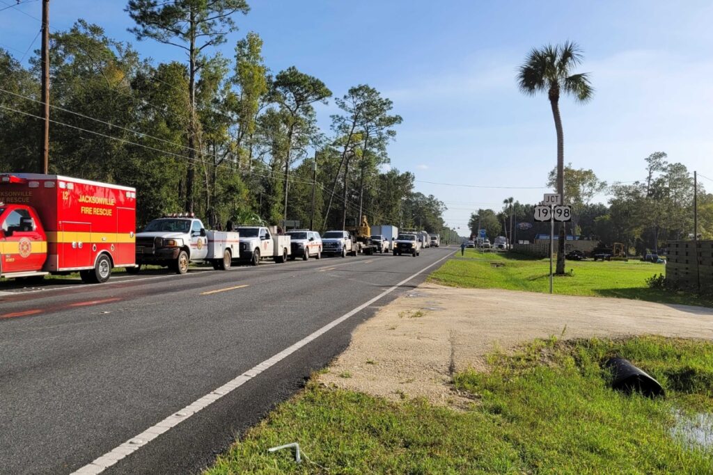 Emergency vehicles line up to get into Cedar Key
