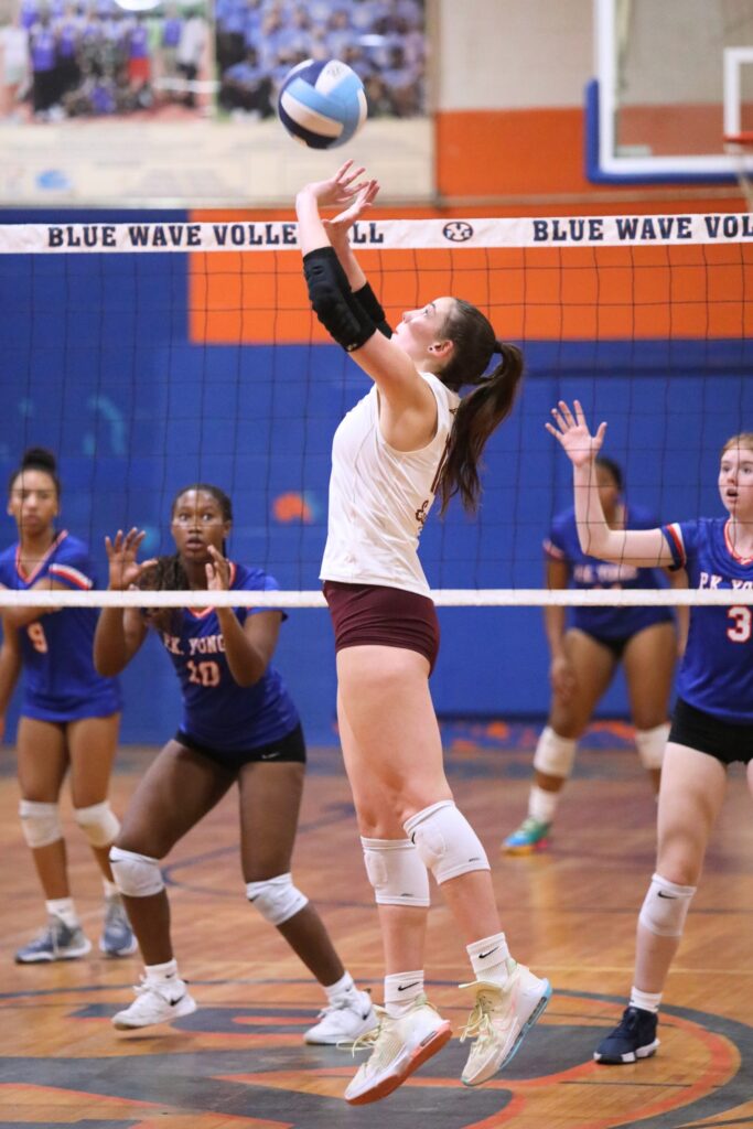 Oak Hall's Cassidy McDonald with a set against P.K. Yonge on Thursday.