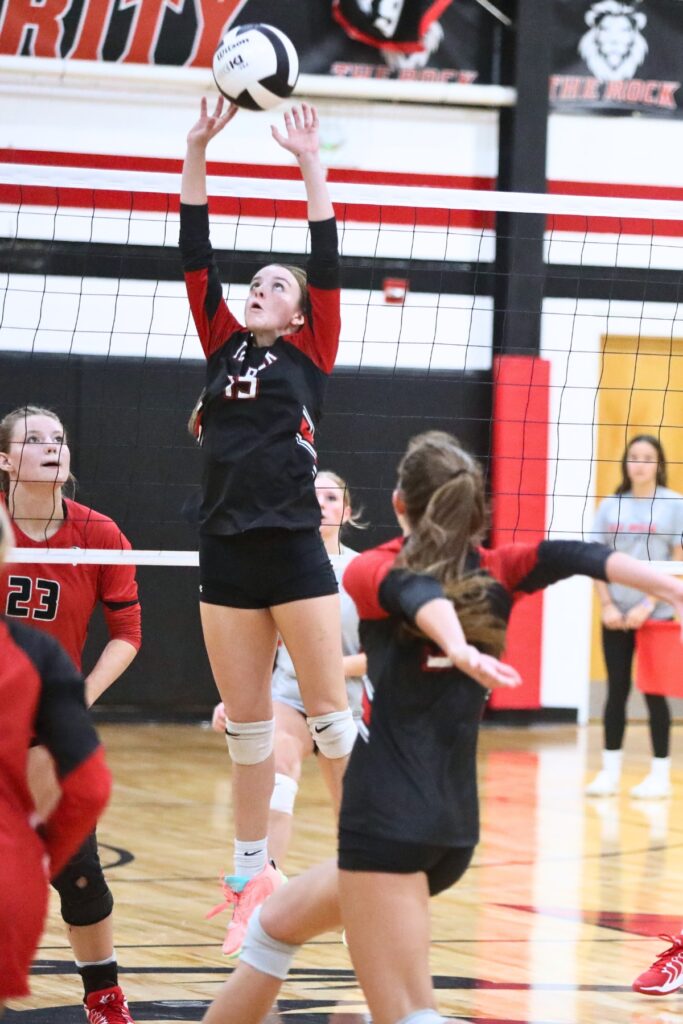 The Rock's Abby Vaillancourt (15) with a set against Santa Fe on Tuesday.