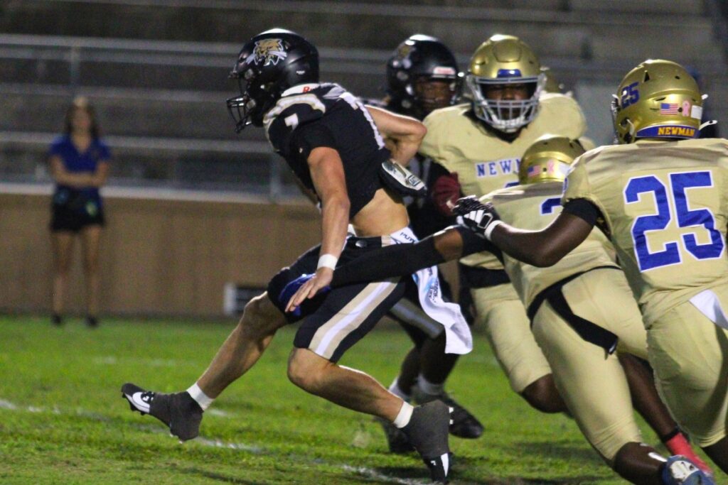 Buchholz Keil McGriff returns the opening kickoff against Cardinal Newman (West Palm Beach).