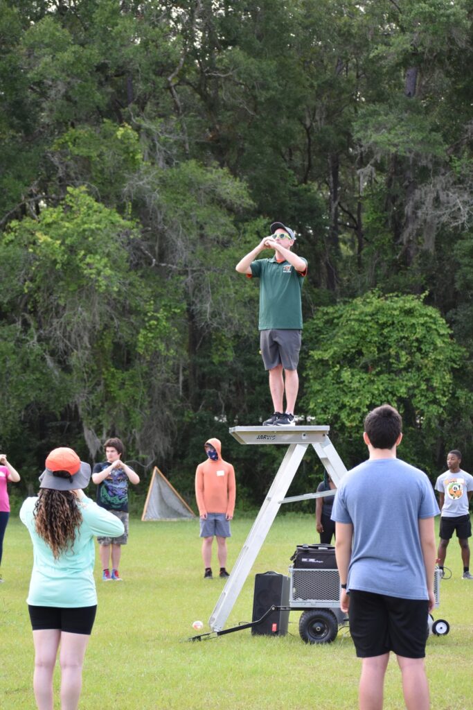Hughes leads band camp students at the one-day band camp.