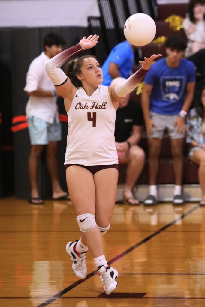 Oak Hall's Sara Duggan (4) with a serve against Providence (Jacksonville) in the Class 2A-Region 1 Quarterfinals.