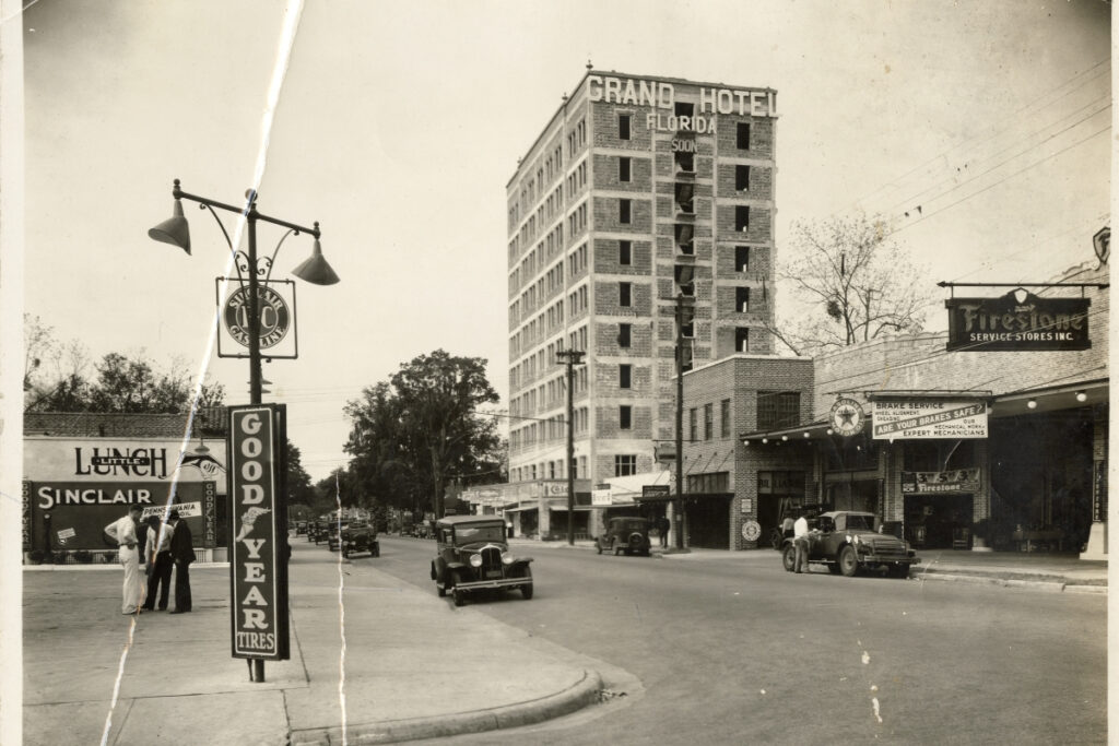 Hotel Kelley stands incomplete after construction stops during the Great Depression. A sign still reads hotel coming soon, but the Seagle Building came instead with a Florida state museum and UF offices. 