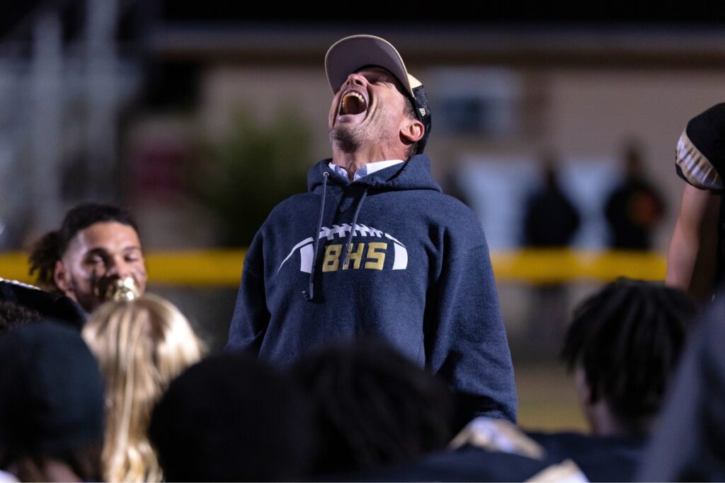 Buchholz coach Mark Whittemore celebrates after the Bobcats win over Oakleaf in the Class 6A-Region 1 Final.