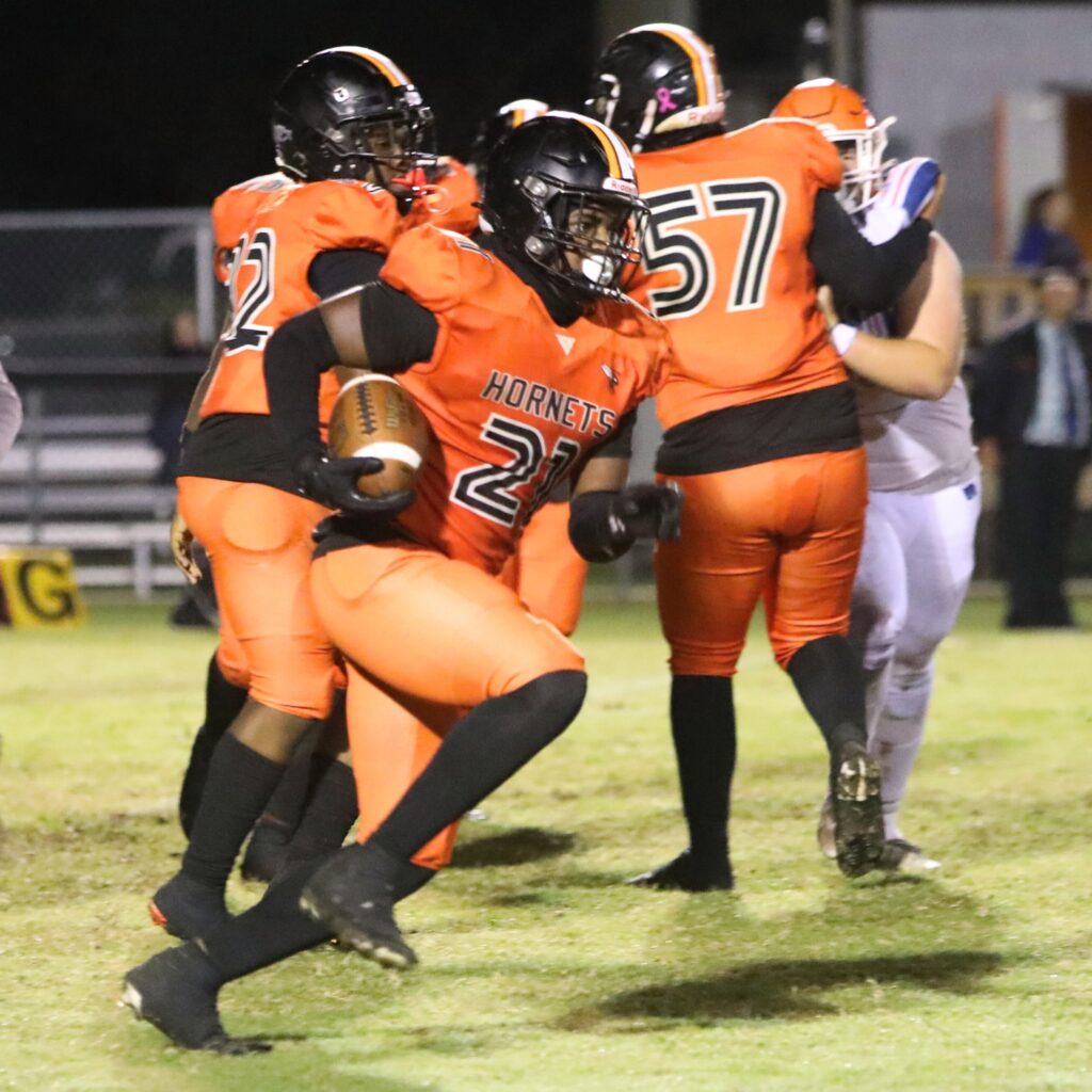 Hawthorne's Loniki Jackson (21) with a run against Branford.