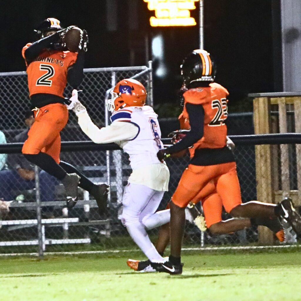 Hawthorne's Nathan Jennings (2) with a second-quarter interception against Branford.