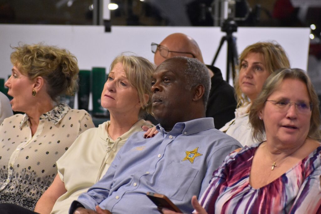 Sheriff Emery Gainey and his wife Cathy watch the last precinct's results come through on Tuesday night.
