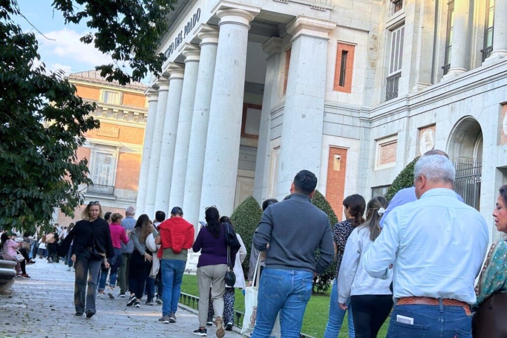Visitors wait to enter the Prado Museum in Madrid, Spain. The Prado offers free admission daily for the last two hours the museum is open.