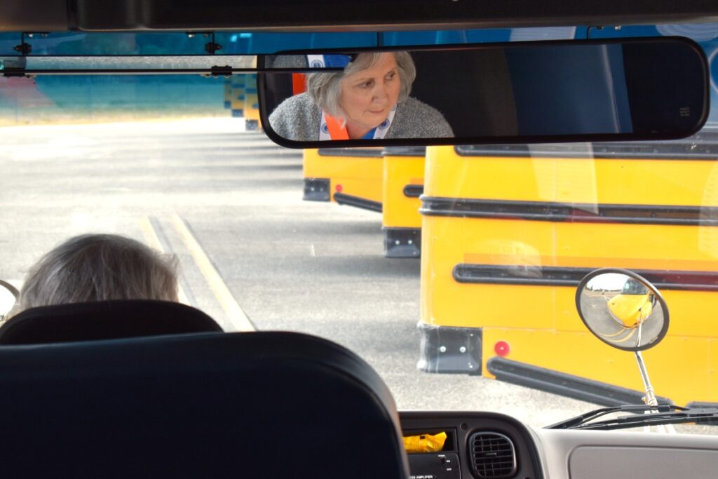 DCPS bus driver Darnell Gainey starts her new bus without a sound. Photo by Glory Reitz