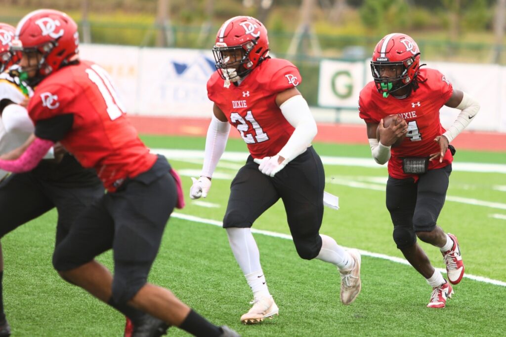 Dixie County's Drew Pleasant (4) with a first-quarter carry against Fort Meade in the Florida Rural Invitational Tournament championship game.