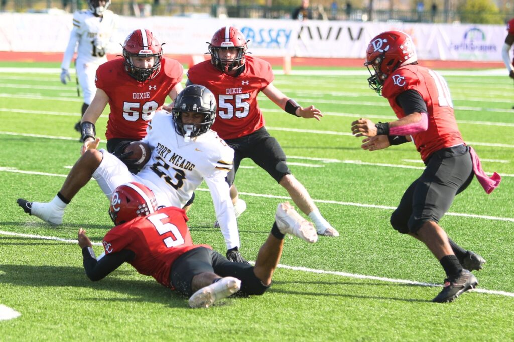 Dixie County's Jaheim Taylor (5) with a tackle against Fort Meade in the Florida Rural Invitational Tournament championship game.