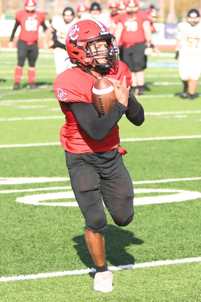 Dixie County's Jaheim Taylor (5) with a third-quarter catch against Fort Meade in the Florida Rural Invitational Tournament championship game.
