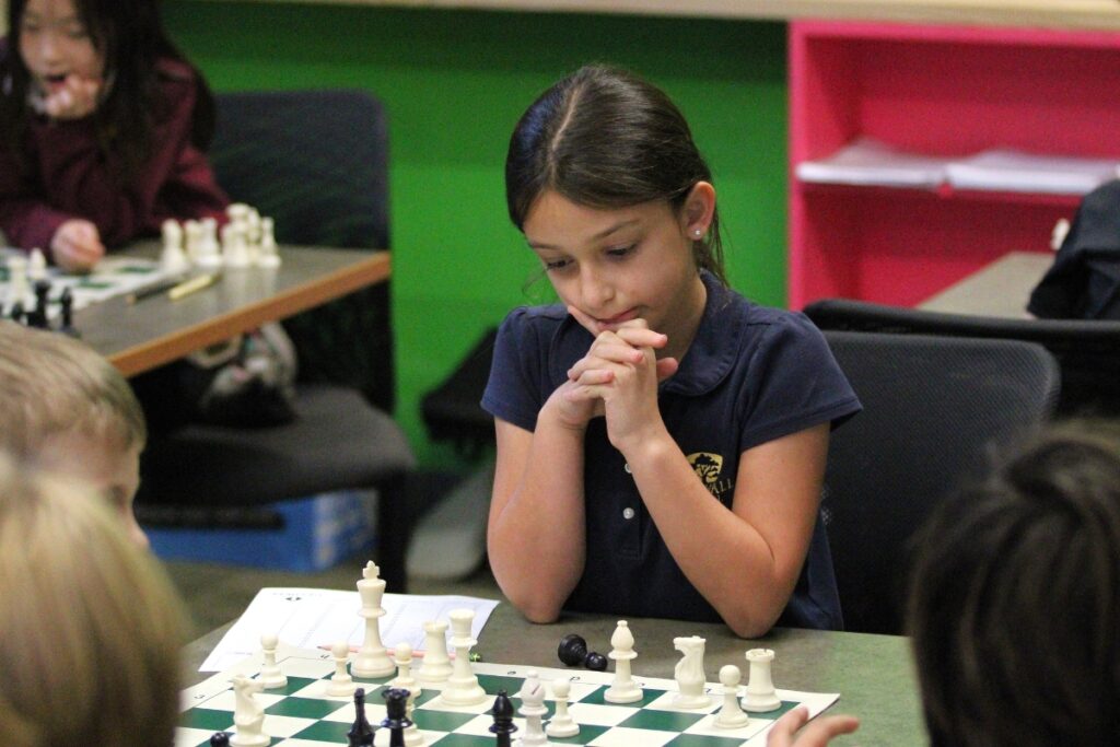 Myka Solberg ponders her position during Oak Hall's practice for the upcoming national tournament. 