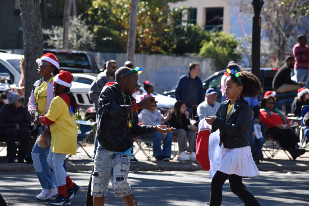 Representatives of the Boys and Girls Club running in the parade.