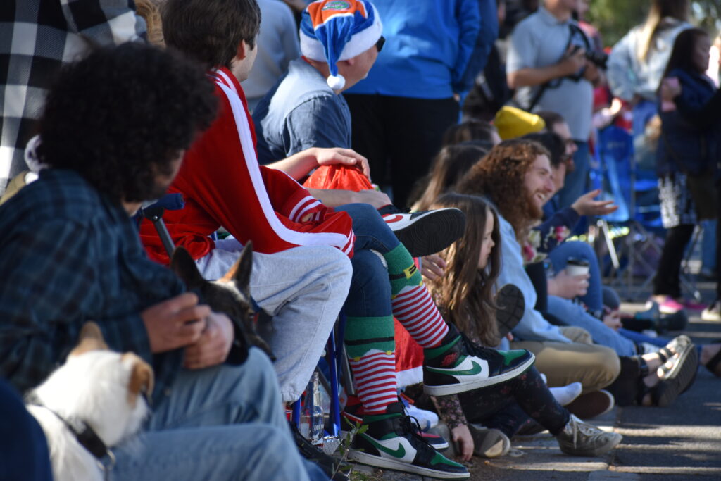 Spectators lined the street to watch the holiday parade.