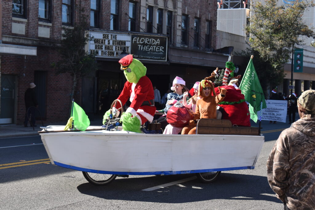 The Urban Yachting Club brought the Grinch to Gainesville for the holiday parade.