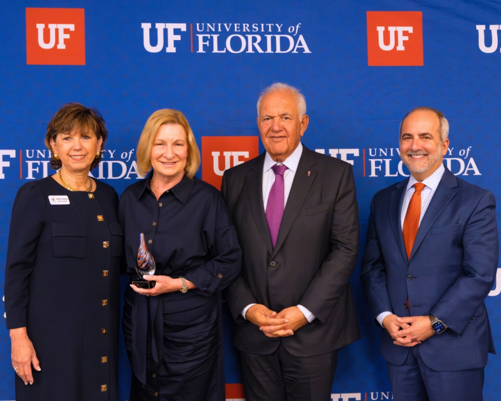 Former CEO of Ronald McDonald House Charities of North Central Florida Sherry Houston (second from left) received the Gainesville community member award.