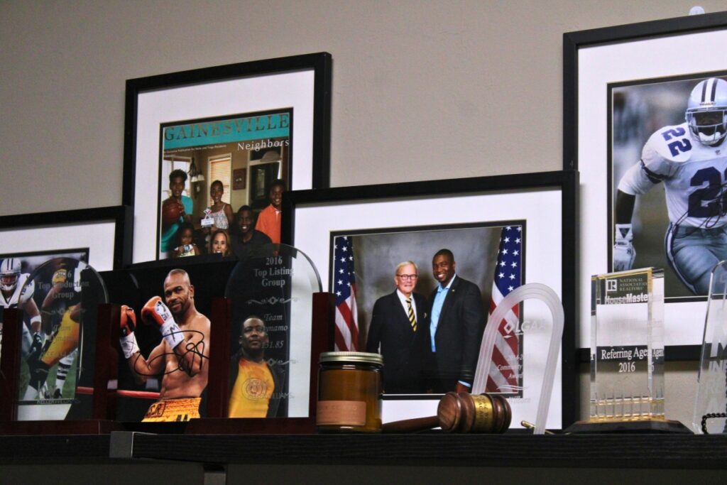 A collection of memorabilia decorating Wilburn's Keller Williams office.