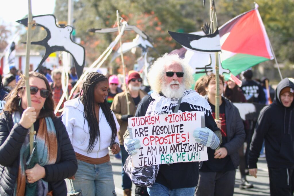 Anti-Zionist Eric Rubin marches with Jewish Voice for Peace in the MLK Day Parade. Photo by Lillian Hamman