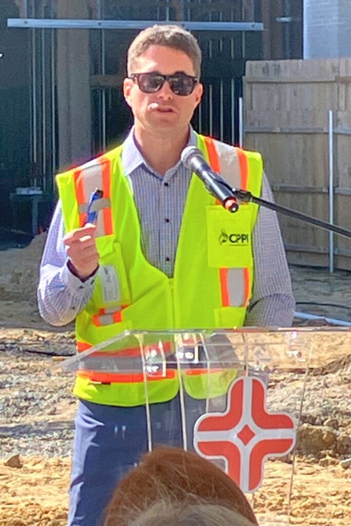 Bryan Harrington, CPPI vice president and regional manager, speaks at Topping Out ceremony. Photo by Lillian Hamman