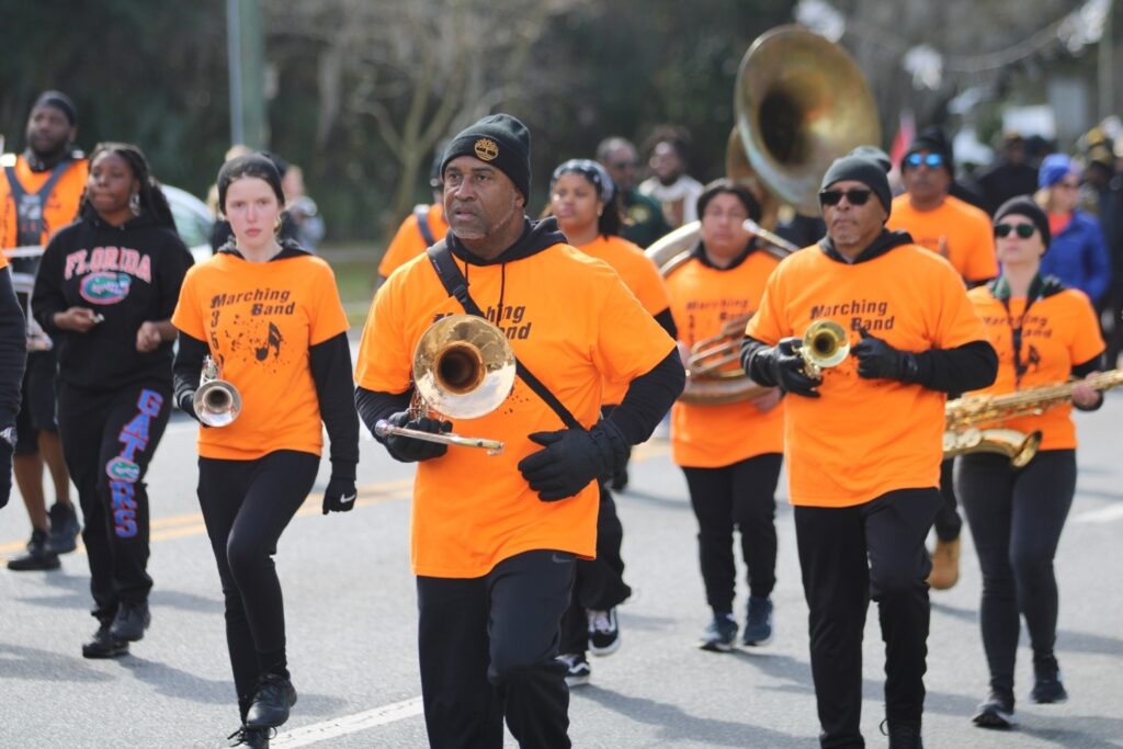 Local 352 Marching Band leads marchers in the MLK Day Parade.