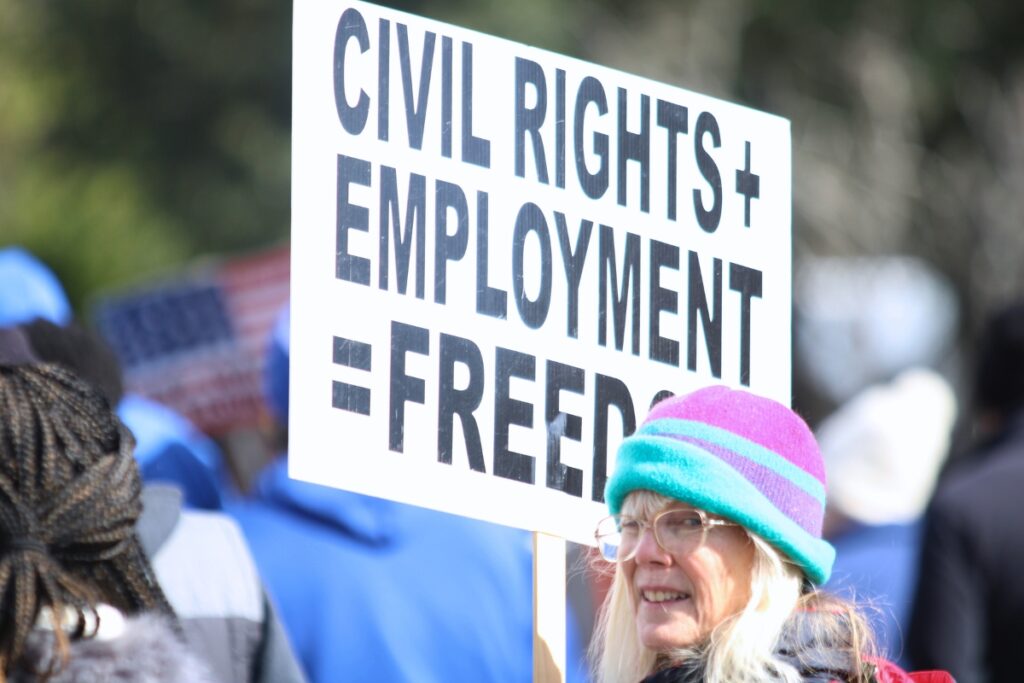 Renee Fields marches in Gainesville's MLK Day Parade in support of unions. Photo by Lillian Hamman