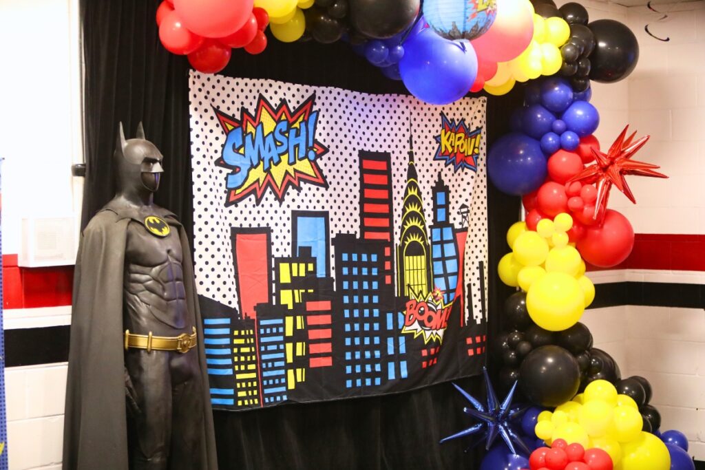 The Rock School hosted its second annual Hoops for Heroes, which included the suit actor Michael Keaton wore in The Batman movie.