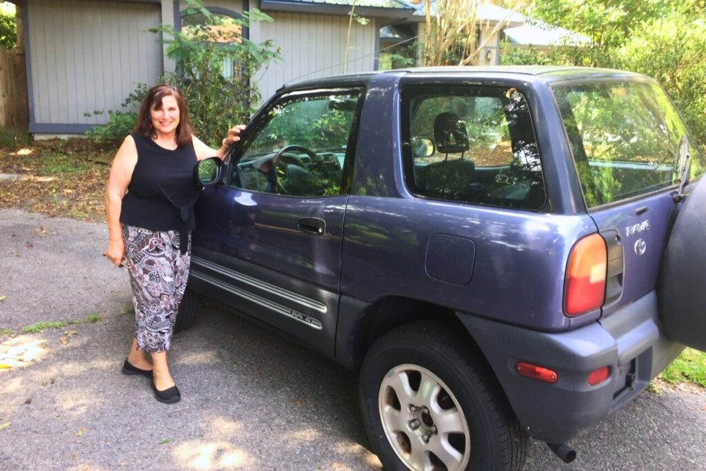 The author, shortly before she had to give up her beloved 1996 Toytal RAV4. Photo courtesy of Ronnie Lovler