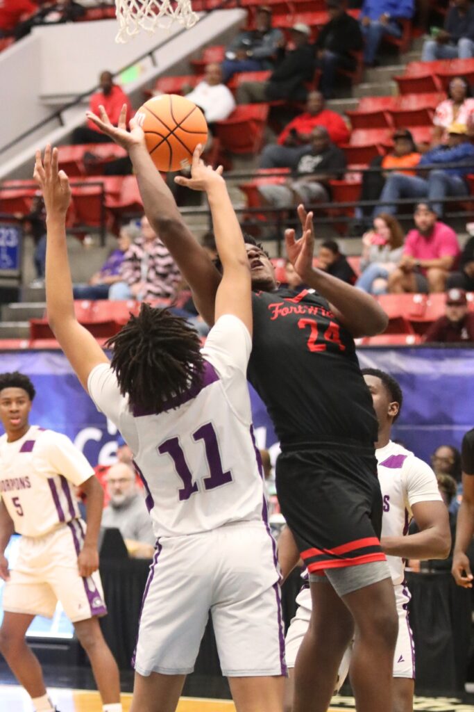 Fort White's Dreyson Lally (24) puts up a shot against Crossroad Academy (Quincy) in the Rural State Semifinals. Photo by C.J. Gish