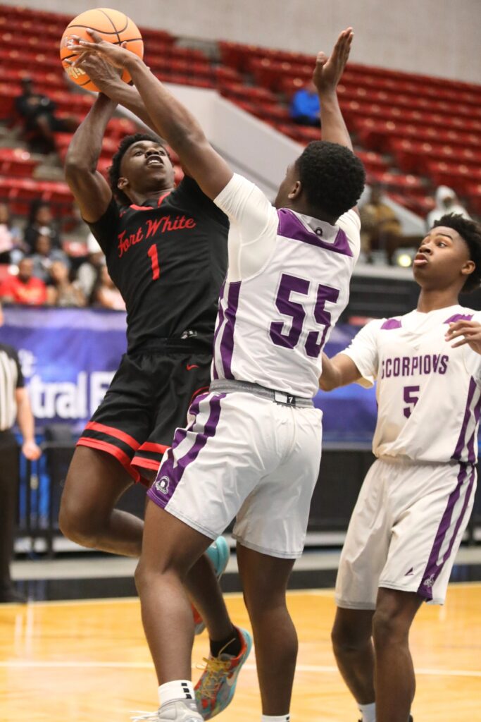 Fort White's Jayden Jackson (1) puts up a shot against Crossroad Academy (Quincy) in the Rural State Semifinals. Photo by C.J. Gish